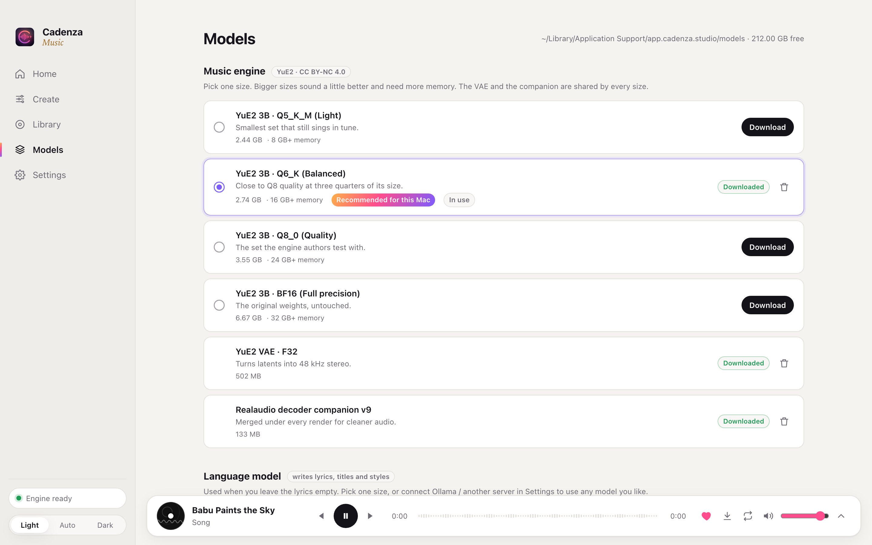 The Models page with recommended model sizes and a download in progress